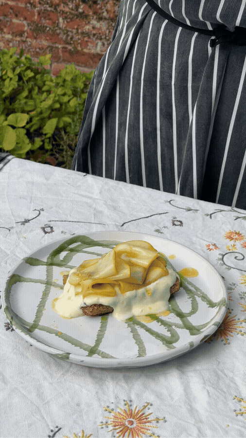 Ricotta and Patty pan squash on toasted bread over ceramic plate